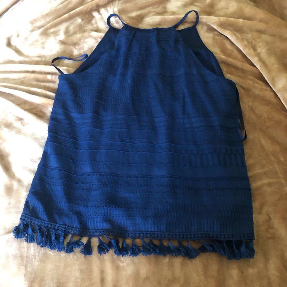 top with straps navy cotton with tassels at hem line  size medium -neck